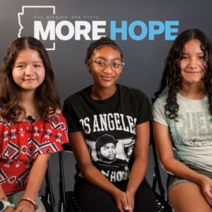 three teen girls smiling with the words "More Hope" above their heads